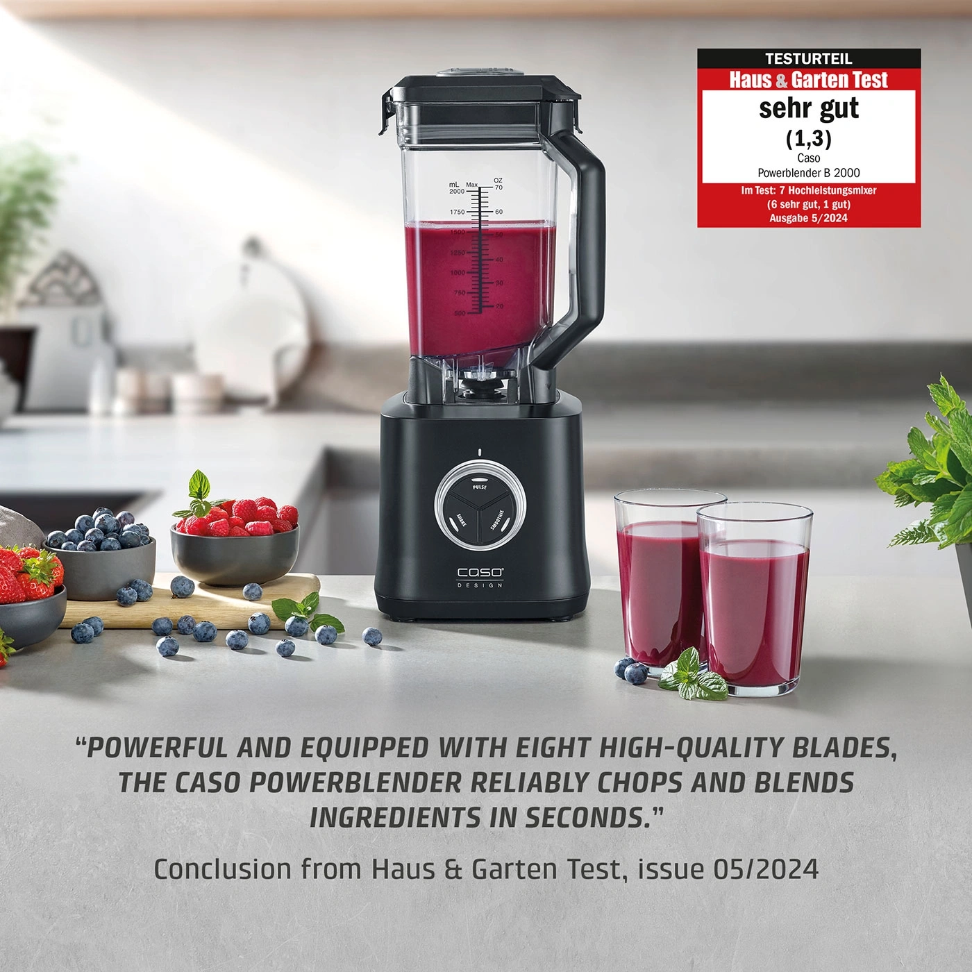 A black Caso high-performance blender with fruit and juice in the image