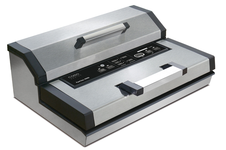 Stainless steel vacuum sealer with controls and handles, perfect for preserving food in the kitchen.