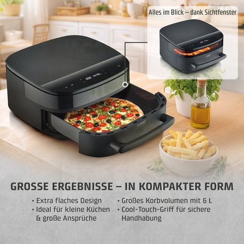 Eine moderne Heißluftfritteuse mit einer Pizza und Pommes Frites