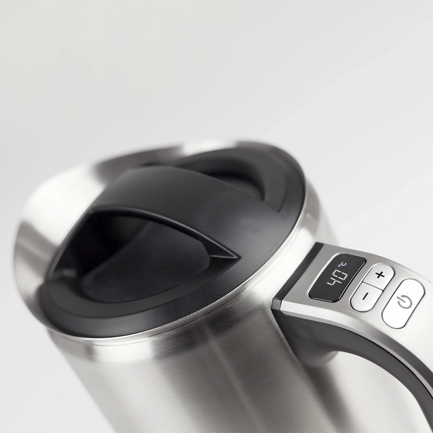 Close-up of a kettle with temperature display and control buttons