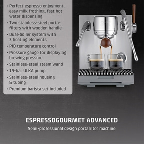 An espresso machine with two glasses of coffee.