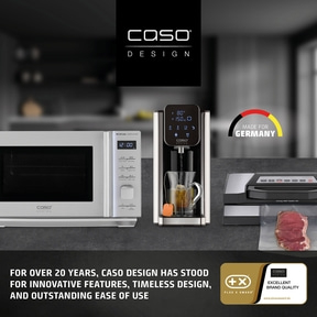 Caso Design microwave, water kettle, and vacuum sealer with meat on a table.
