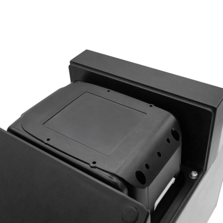 Black casing with rectangular recess and holes, close-up detail shot