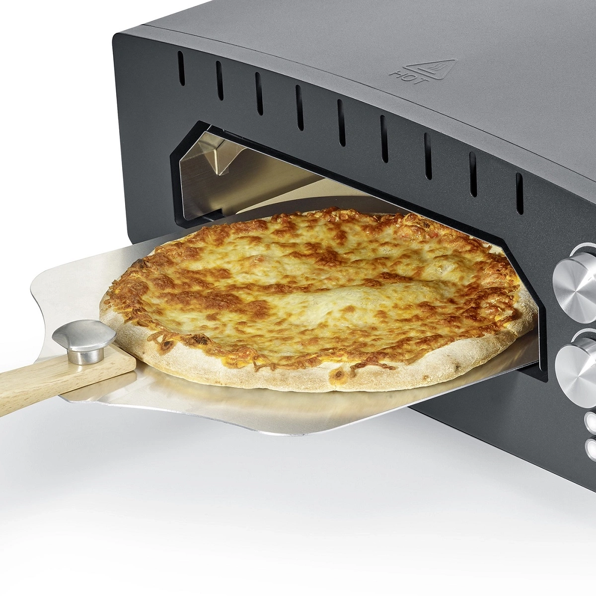 Pizza in oven, on pizza peel, hot and delicious, cheese