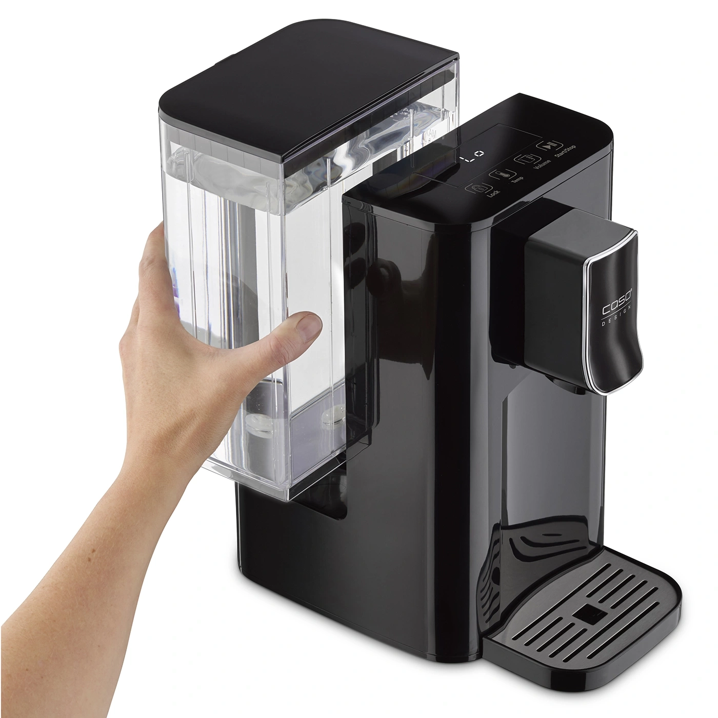 Black water boiler with removable water tank held by a hand, close-up shot.