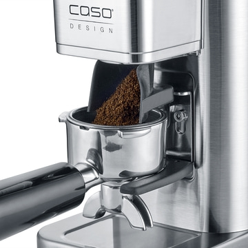 Coffee grinder with coffee powder, stainless steel, Caso Design, close-up, detail