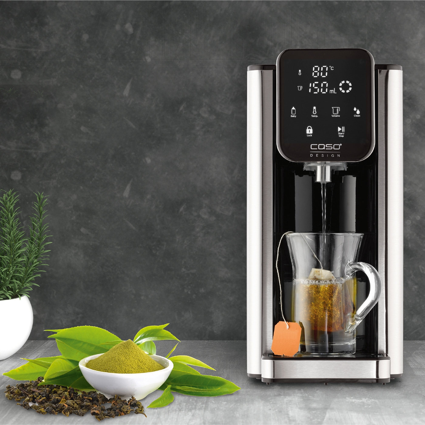 Tea machine with teabag and ingredients, ready for a cup of tea.