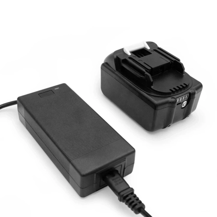 Black battery and charger on white background, power supply, tool, charging