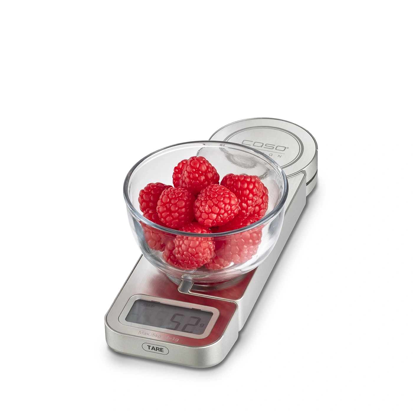 Himbeeren in einer Glasschüssel auf einer Waage, Nahaufnahme