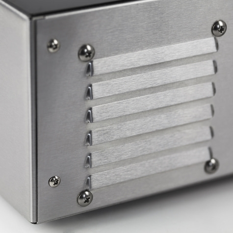 Metal enclosure with screws and vents, close-up, silver-colored design, industrial look