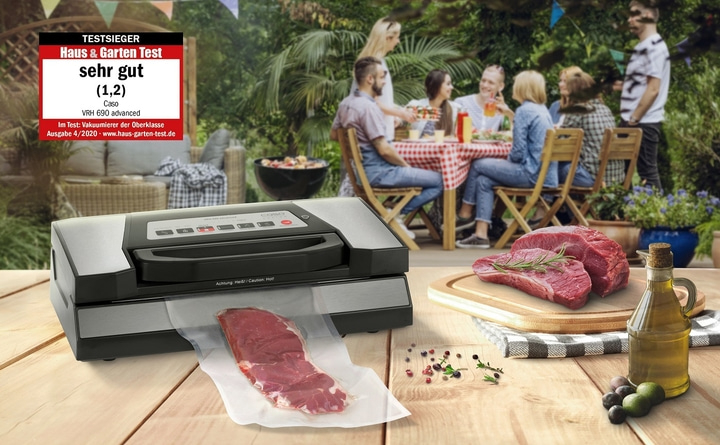 Vacuum sealer with meat and a group of people in the background