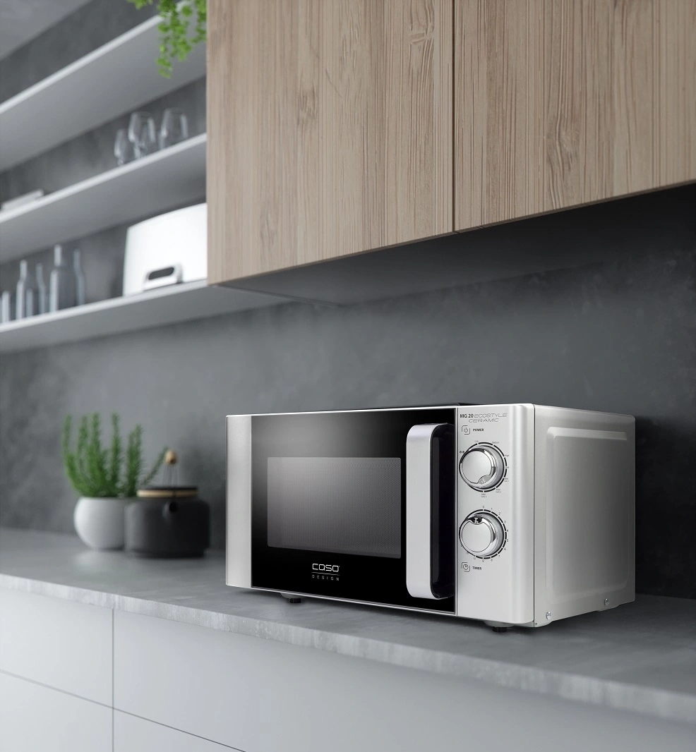Microwave in a modern kitchen. Silver, black and wood. Home appliance.