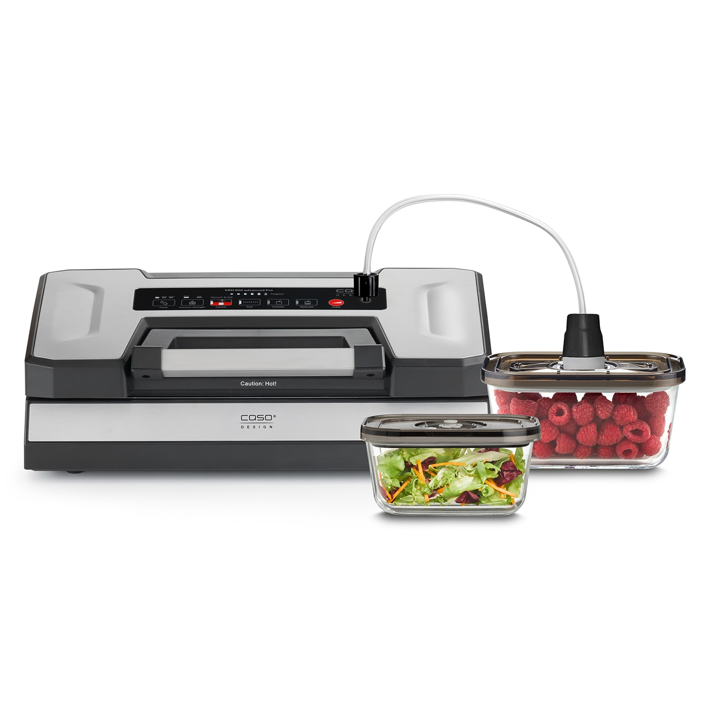 Vacuum sealer with containers filled with raspberries and salad.
