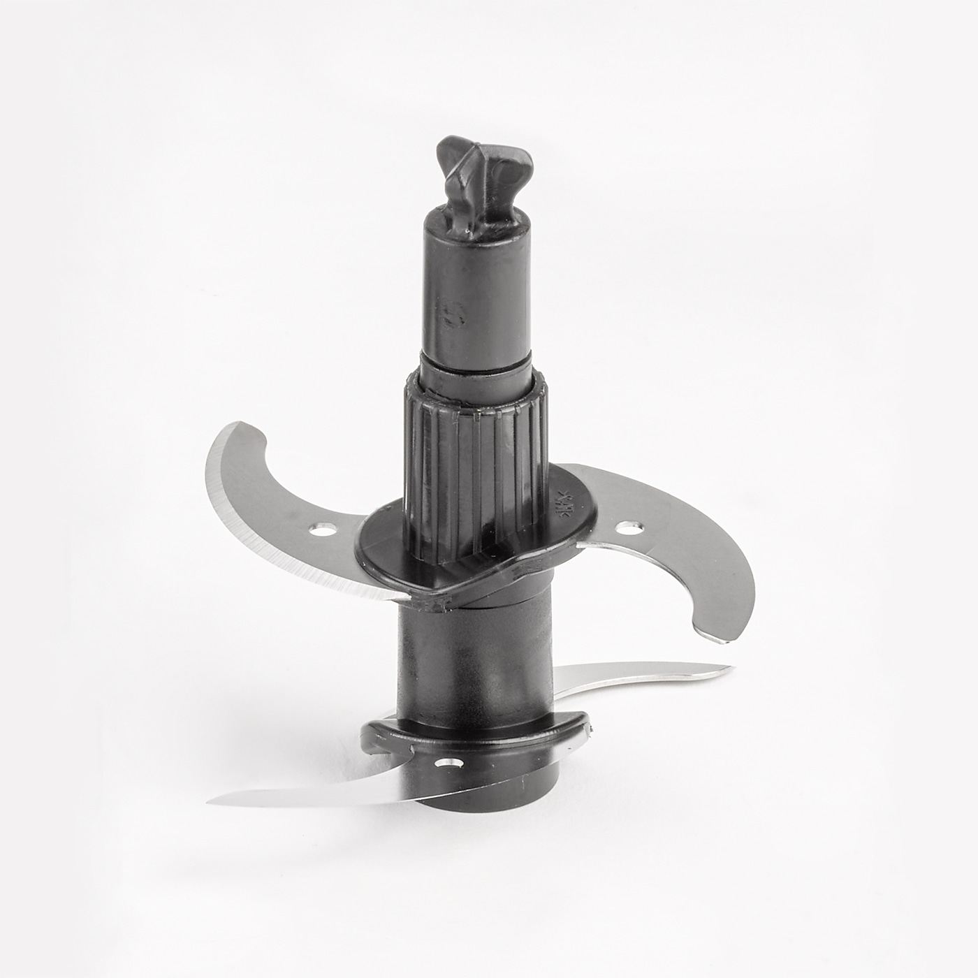 Black kitchen appliance with blades on white background, close-up shot.