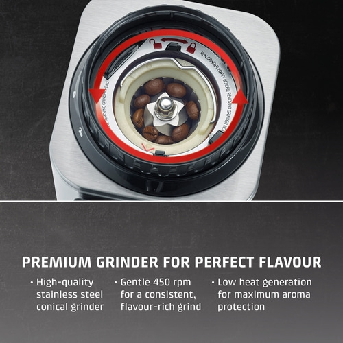 Coffee grinder with coffee beans and grinding mechanism details