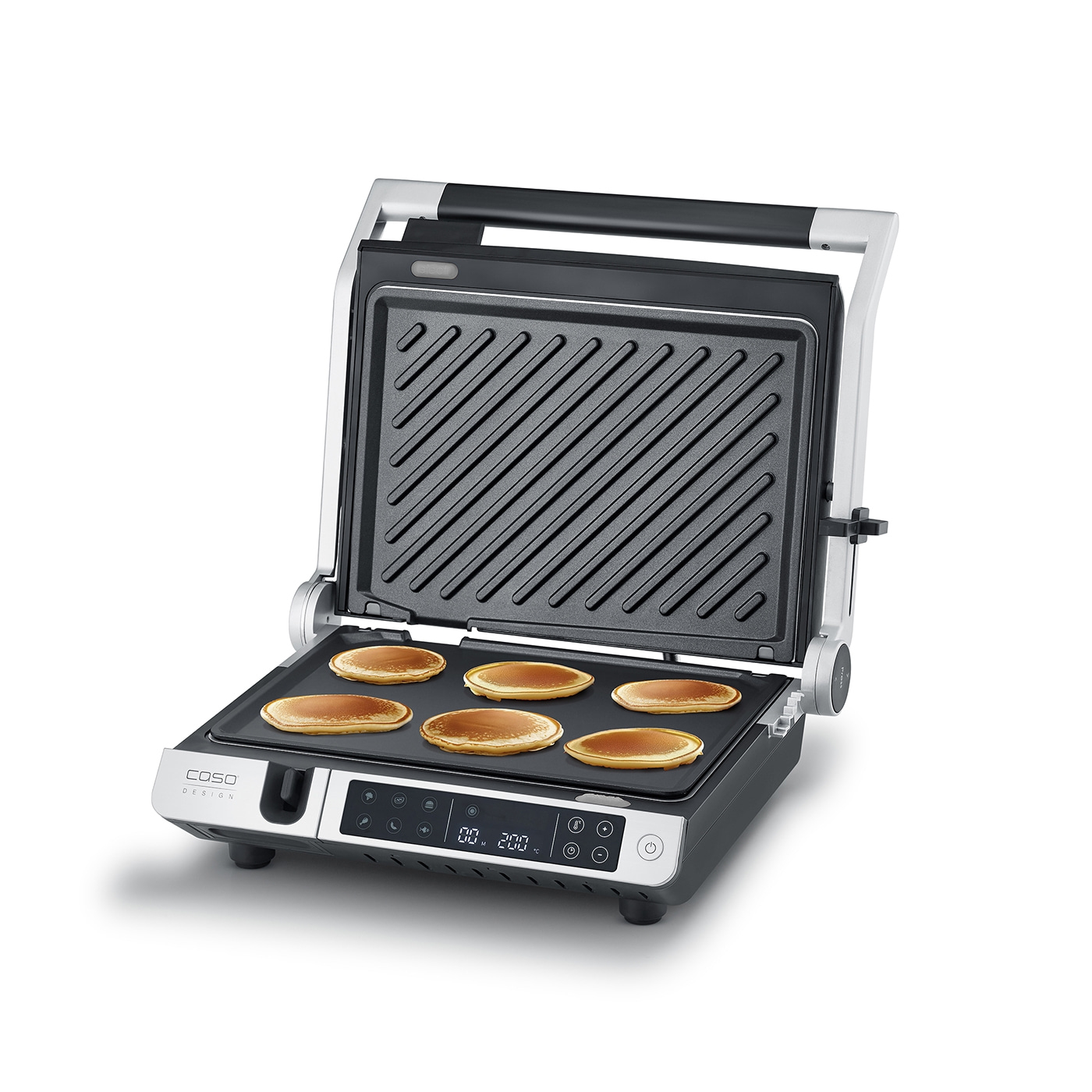 Electric contact grill with pancakes, open, on white background