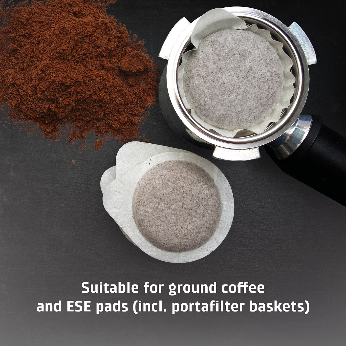 Coffee pods and ground coffee on black surface. Suitable for ground coffee and E.S.E pads.