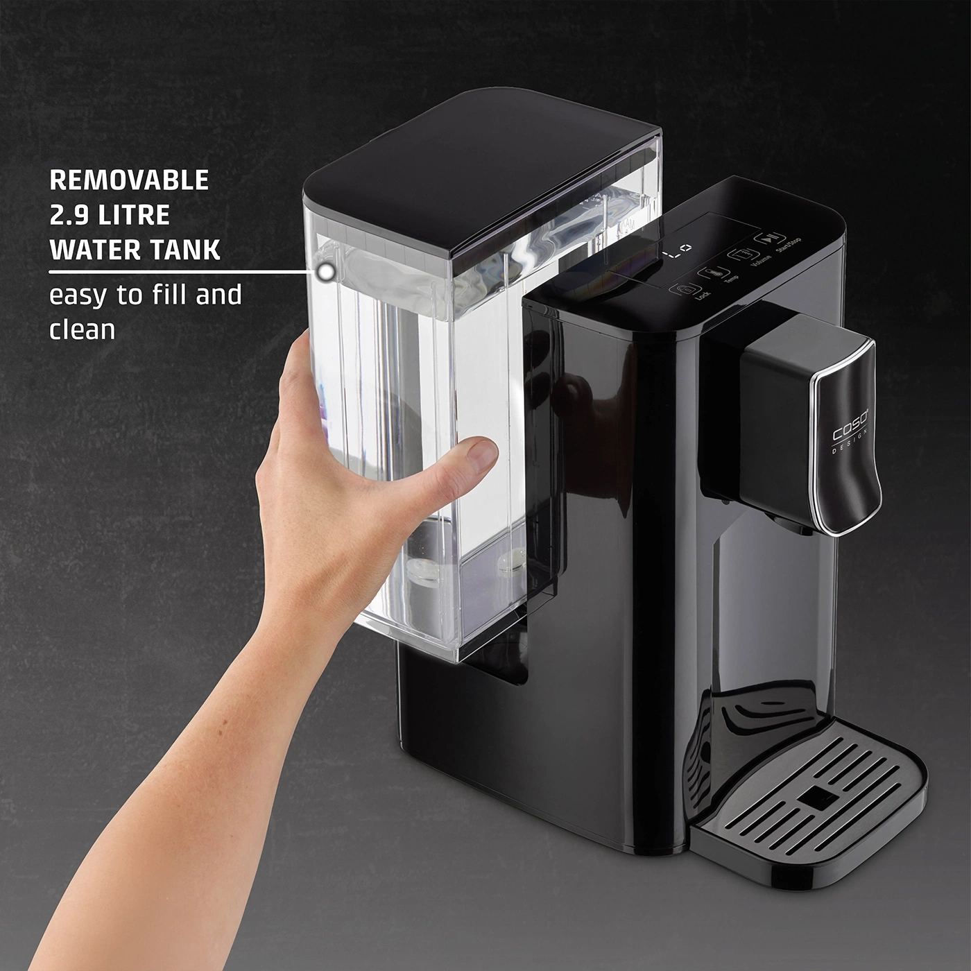 Black water boiler with removable water tank held by a hand, easy to fill and clean.
