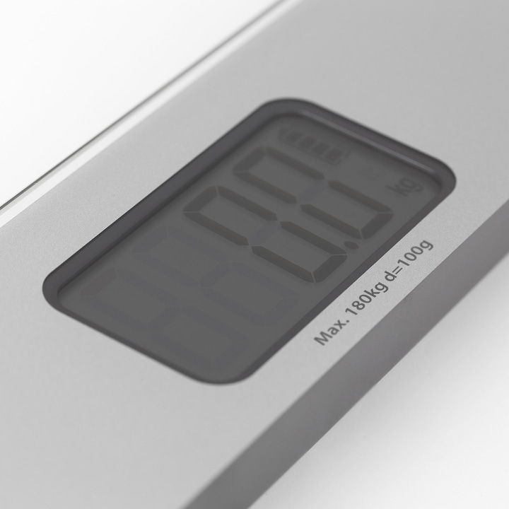 Digitale Waage mit Anzeige von 0.0 kg, maximale Kapazität 180 kg.