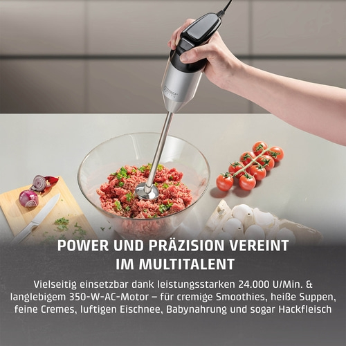 Hand blender in action, preparing minced meat, versatile, power and precision, kitchen appliance.