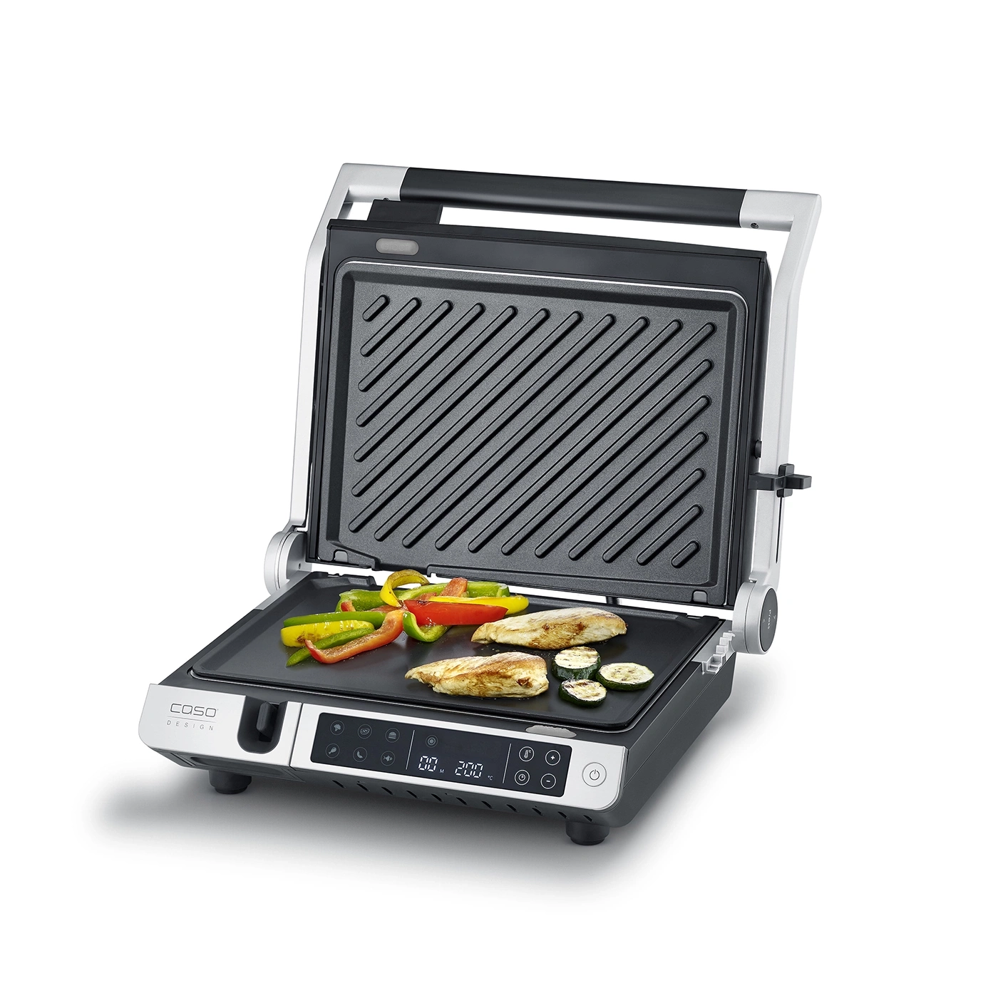 Offener Elektrogrill mit Gemüse und Fleisch, bereit zum Kochen.
