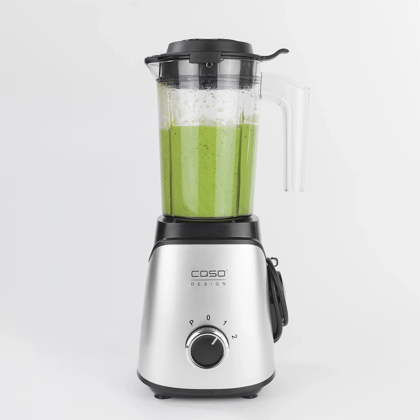 Silver blender with green contents isolated on white background, Caso Design