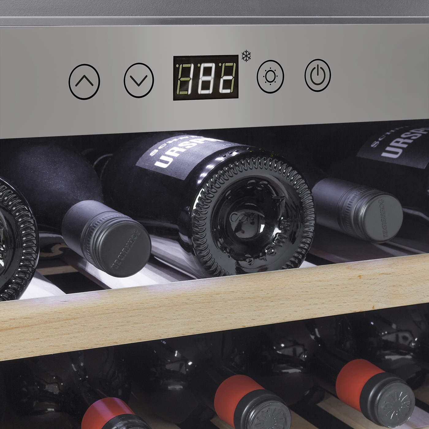 Wine cooler with temperature display and wine bottles inside the cooler.