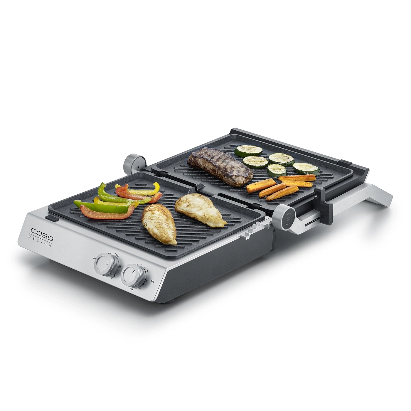 Elektrischer Grill mit Gemüse und Fleisch, bereit zum Kochen.