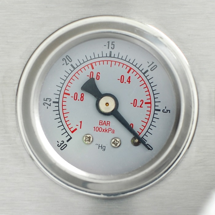 Vacuum gauge reads -0.2 bar. Silver casing, black needle, red scale markings.