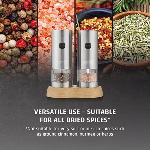 Two electric spice grinders on a wooden stand, surrounded by various spices.