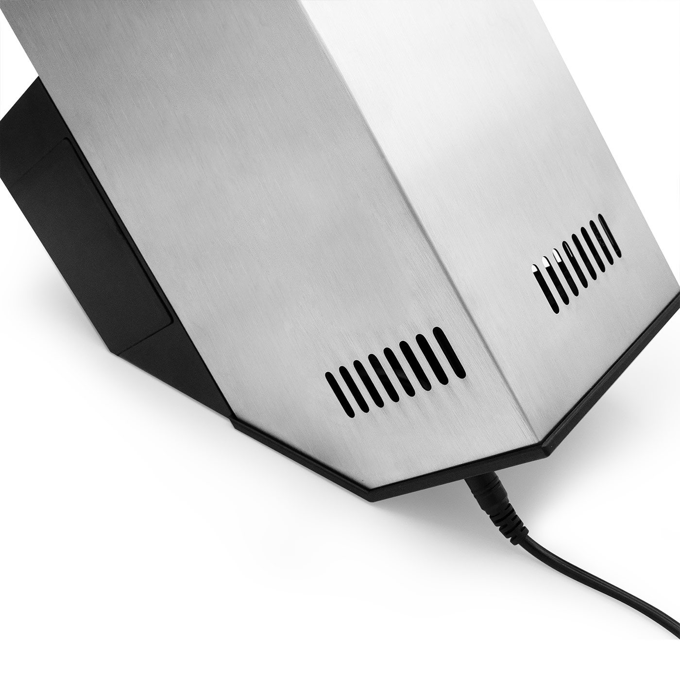 Stainless steel housing with vents and power cord, close-up detail, isolated
