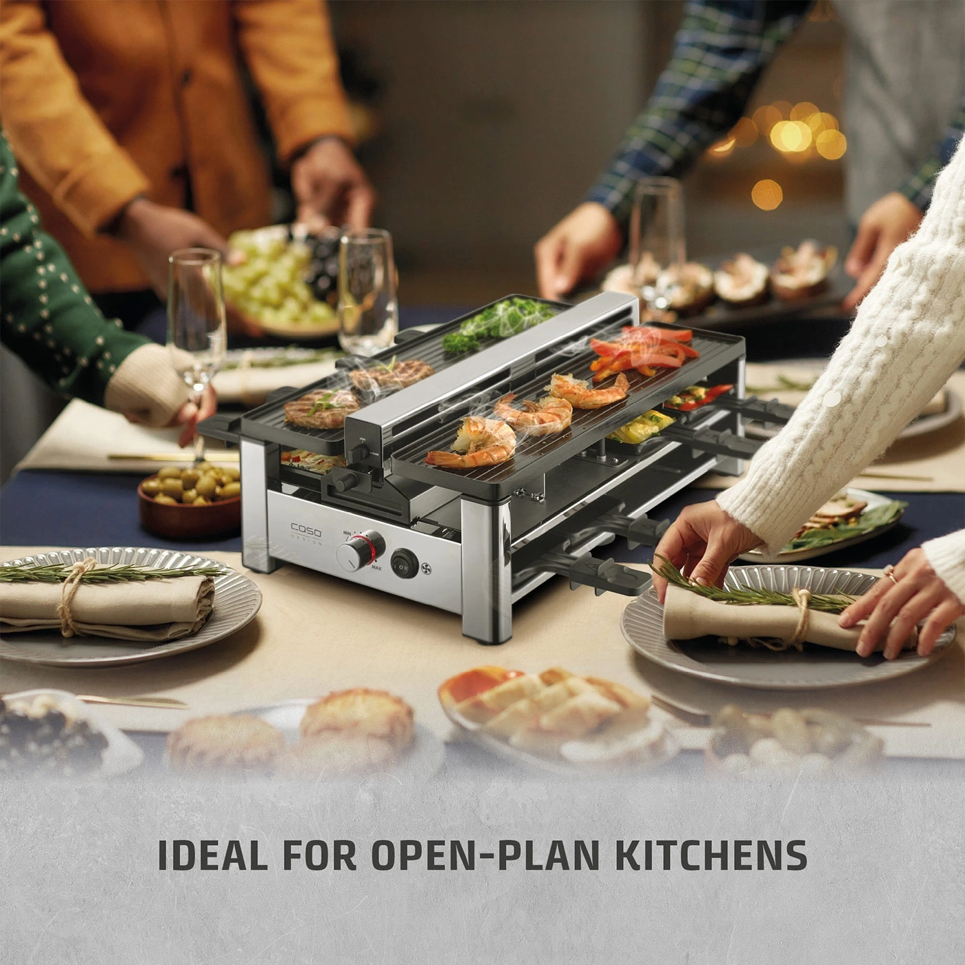 Raclette grill with shrimp and meat for a shared meal.