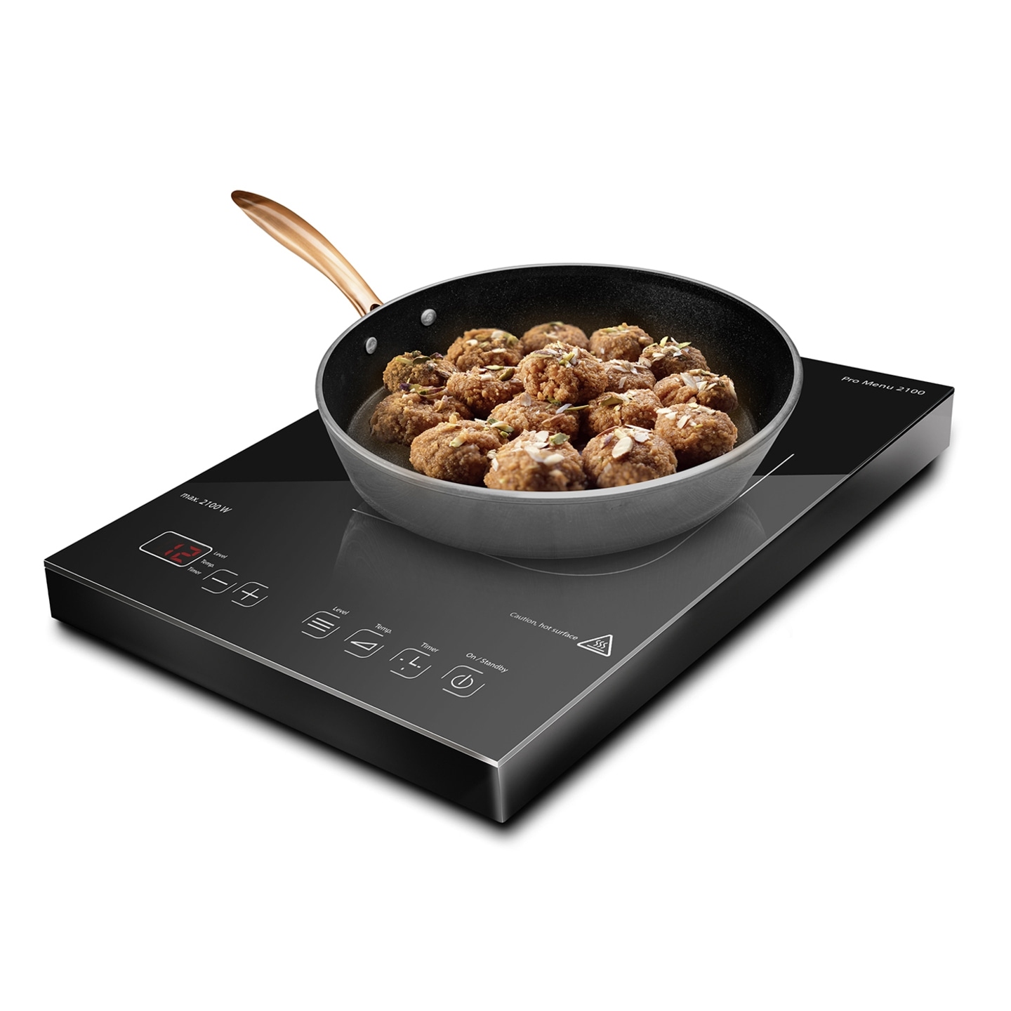 Induction cooktop with pan of meatballs. Cooking on the stove. Preparing food for dinner.