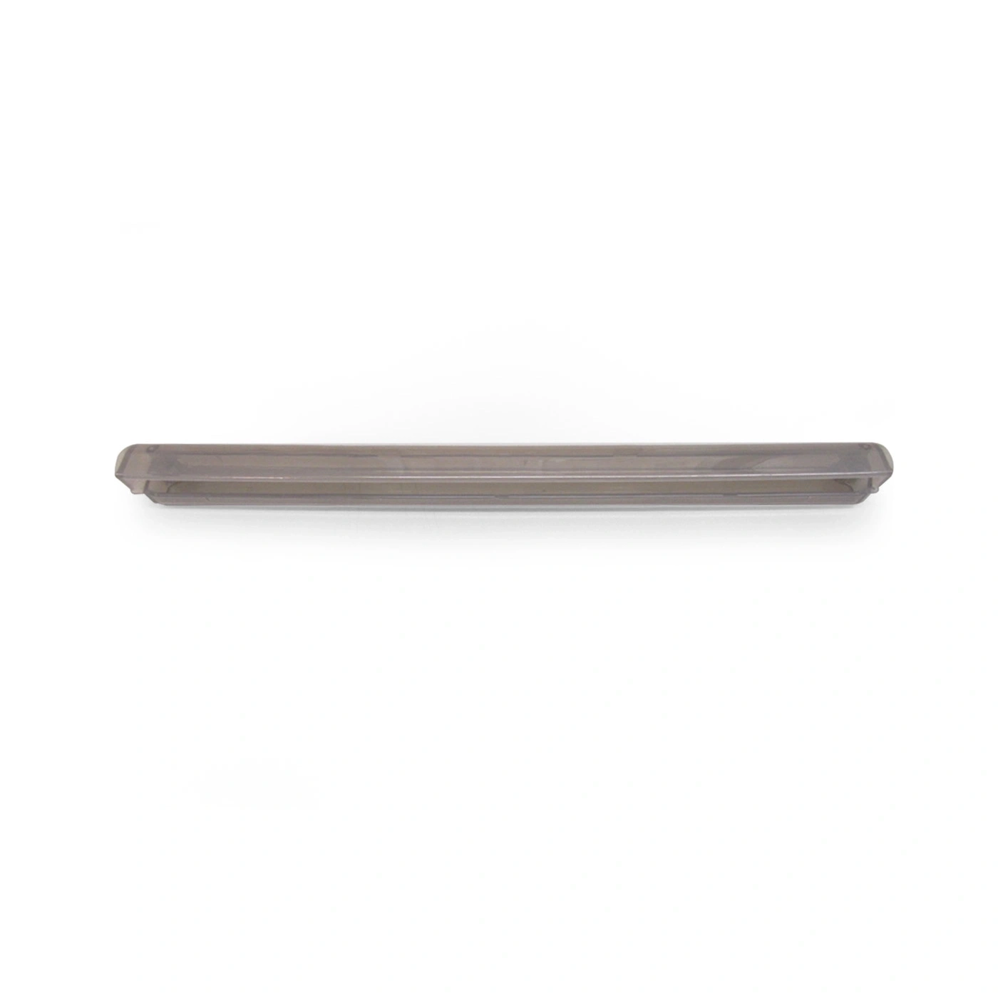 Gray, elongated object on white background, close-up detail shot